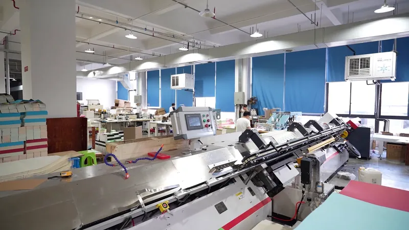 A wider view of production equipment and the surrounding workshop layout