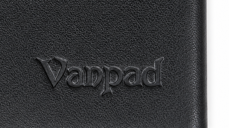 Pressed black logo on textured notebook cover material