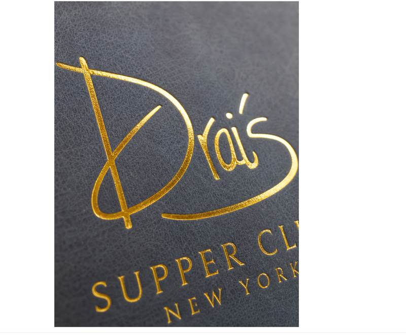 Gold foil logo hot stamping on dark textured notebook cover